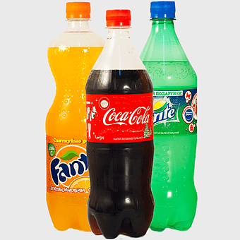 Fanta orange soda, Coca-Cola classic bottle, Sprite green bottle, assorted soda bottles, carbonated beverages collection, refreshing drink trio, popular soft drinks display
