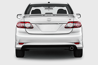 2013 Toyota Corolla rear view, 2012 Toyota Corolla compact car, rear windshield of sedan, vehicle registration plate, Toyota Corolla sedan features, automotive exterior design rear, car rear lighting details