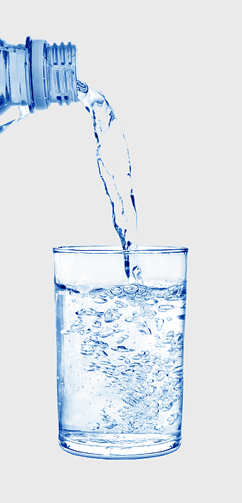 water glass pouring, mineral water splash, clear glass cup, drinking water bottle, refreshing hydration, liquid flow, crystal-clear beverage