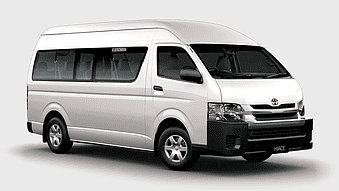 white Toyota HiAce van, compact van transportation, Toyota HiAce passenger vehicle, minivan automotive exterior, commercial van service, white van rental, van for group travel