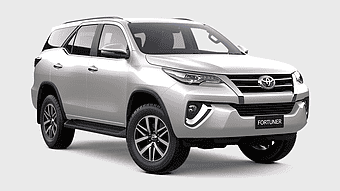 silver Toyota Fortuner SUV, Toyota Fortuner tuning, mid size car, luxury vehicle, compact SUV design, automotive exterior features, four-wheel drive performance