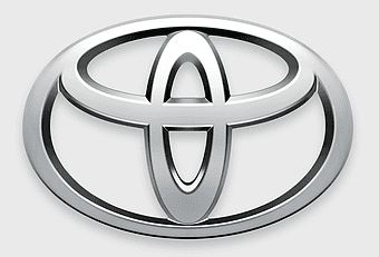 Toyota emblem, car dealership logo, silver automotive symbol, used car branding, vehicle insignia design, automotive industry icon, car manufacturer badge