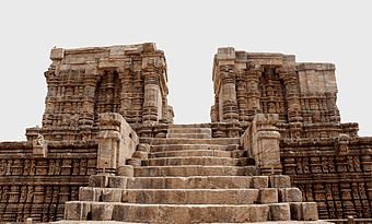 Hindu Temple in India, medieval historic site, ancient stone architecture, world heritage monument, intricate stone carvings, cultural ruins visual, ancient civilization landmarks