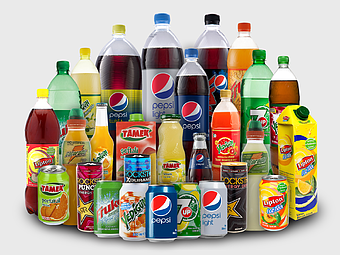 plastic beverage bottles, assorted soft drinks, carbonated water collection, Fanta juice variety, drink packaging options, refreshment drink assortment, beverage brand selection